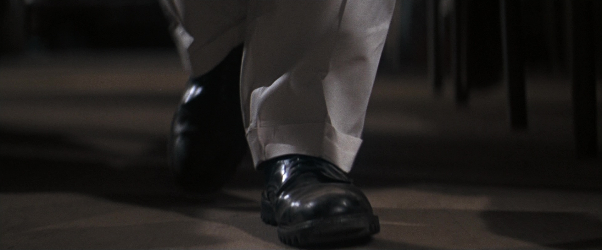 A man crouched low on the ground